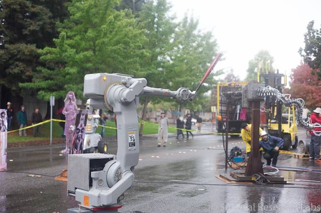 Motoman and Spine Robot in the rain
